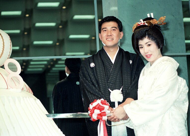 1980年に巨人からドラフト指名。1986年5月に結婚発表、11月に挙式　©KYODO