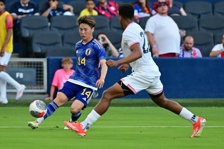 アメリカ戦で2つのポジションをこなした三戸　©JIJI PRESS