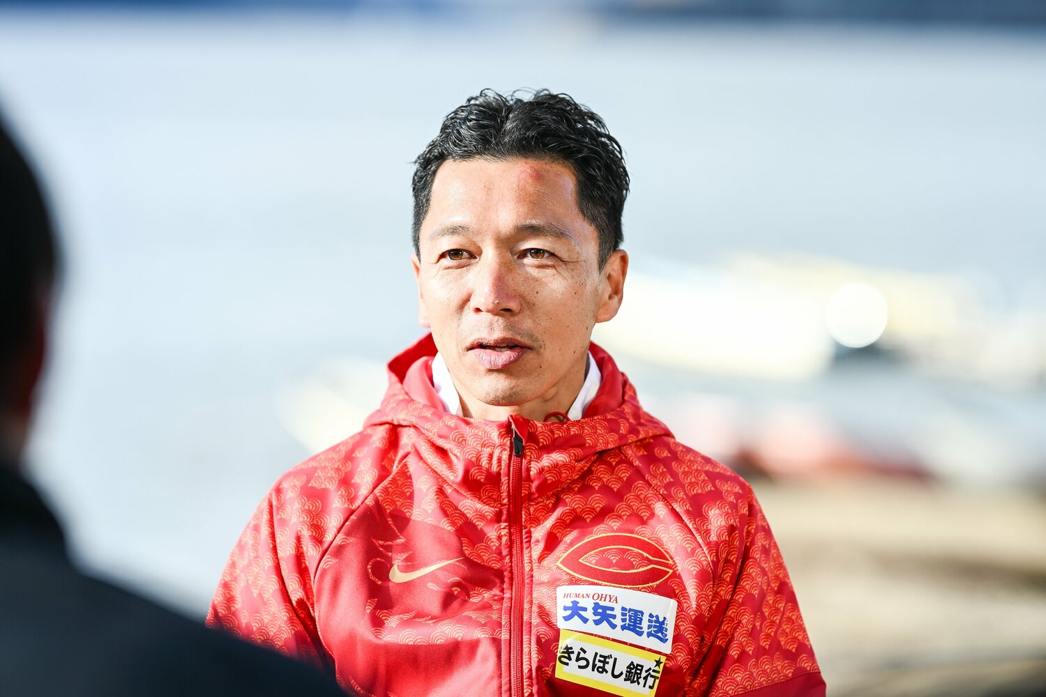 原監督による「5区・黒田朝日」の奇策を笑顔で振り返る中大・藤原監督　©Nanae Suzuki