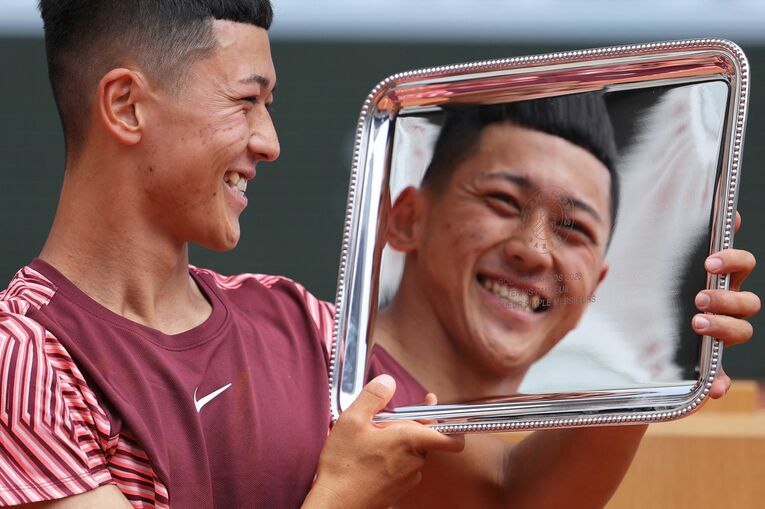 優勝した小田　©AFP=JIJI PRESS