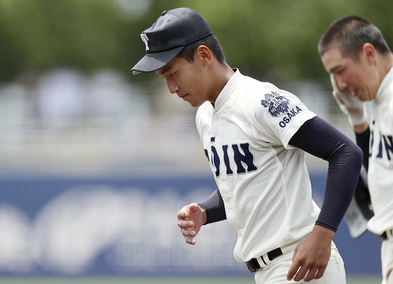 うつむくエース前田悠伍　©KYODO