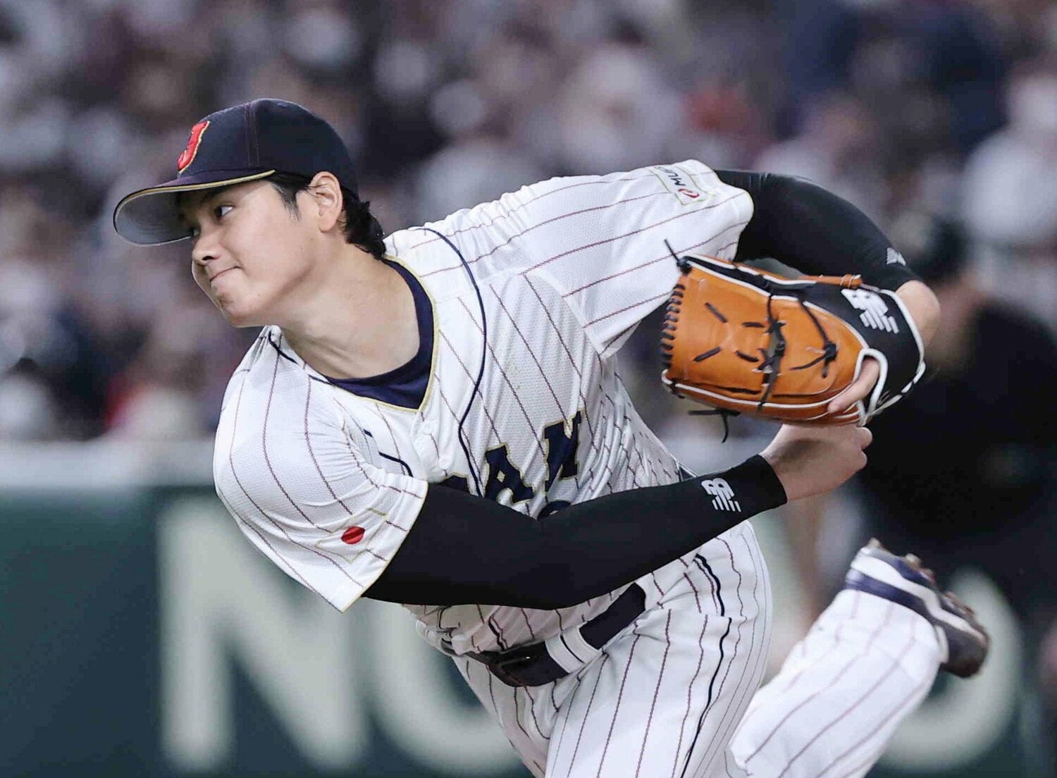 3月9日のWBC中国戦で投球する大谷。フィジカル面の緻密な調整が、投打両方での活躍を生んでいる　©JIJI PRESS