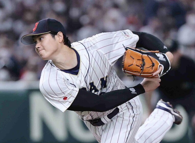 3月9日のWBC中国戦で投球する大谷。フィジカル面の緻密な調整が、投打両方での活躍を生んでいる　©JIJI PRESS