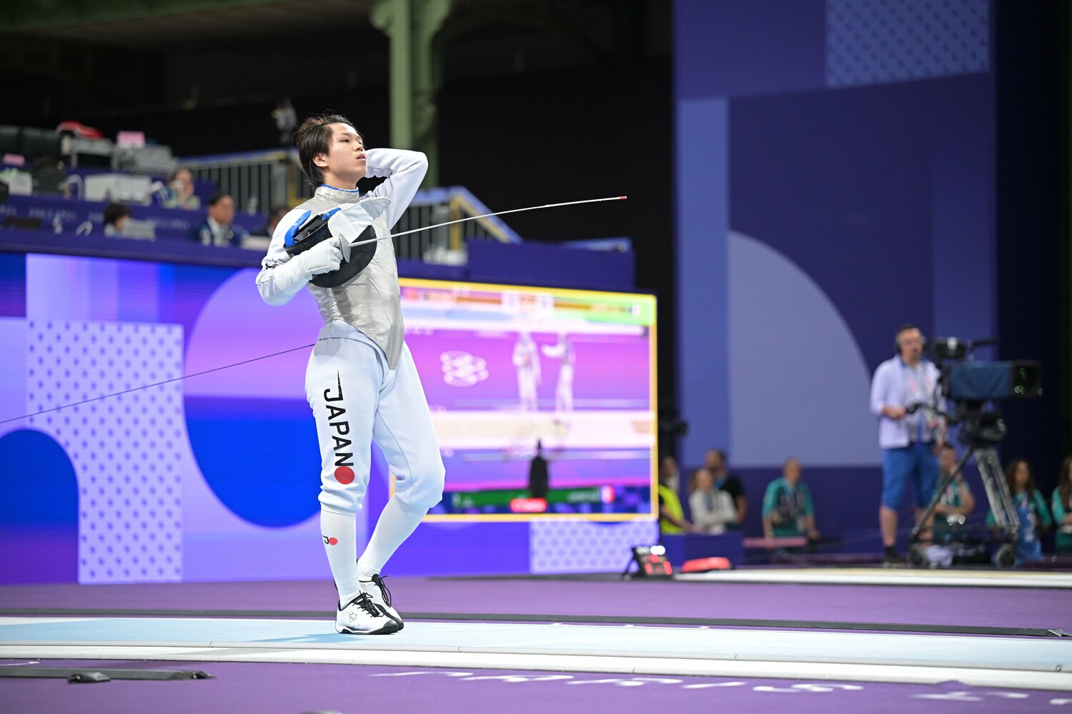 試合中にしばしば見せる髪をかきあげる仕草　©Takuya Kaneko/JMPA