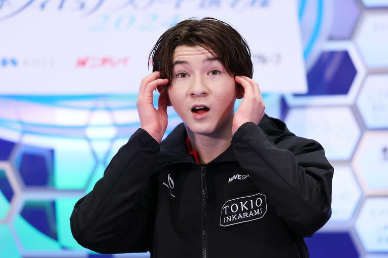 全日本選手権ショートの得点（90.31）に驚きの表情をみせる中田　©︎AFLO