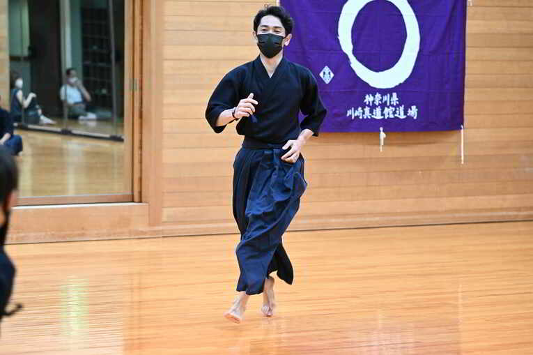 鬼ごっこに全力で取り組む戸崎総代表　©Keiji Ishikawa