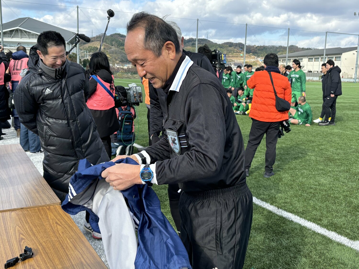 久しぶりのユニフォーム姿に少し照れくさそうな青木さん　©︎Takahito Ando