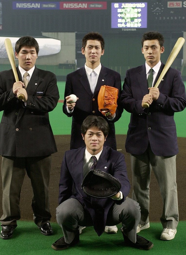 中村剛也（左・大阪桐蔭）／栗山巧（右・育英） ／ photograph by JIJI PRESS