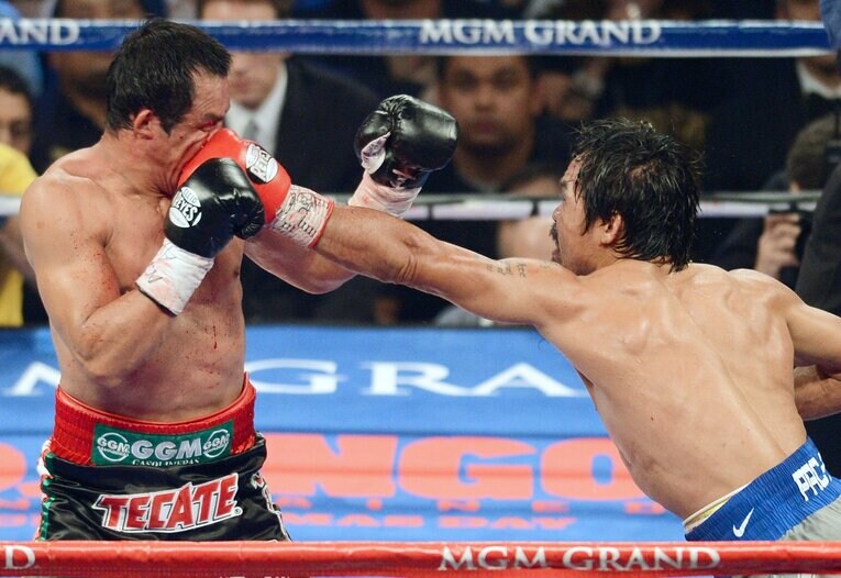 2012年12月、宿敵ファン・マヌエル・マルケスと4度目の対戦