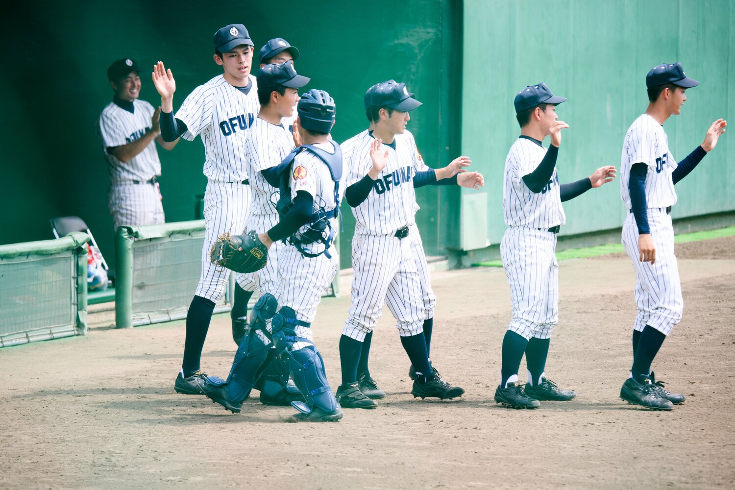 決勝の様子。ナインを鼓舞する佐々木朗希　©︎Asami Enomoto