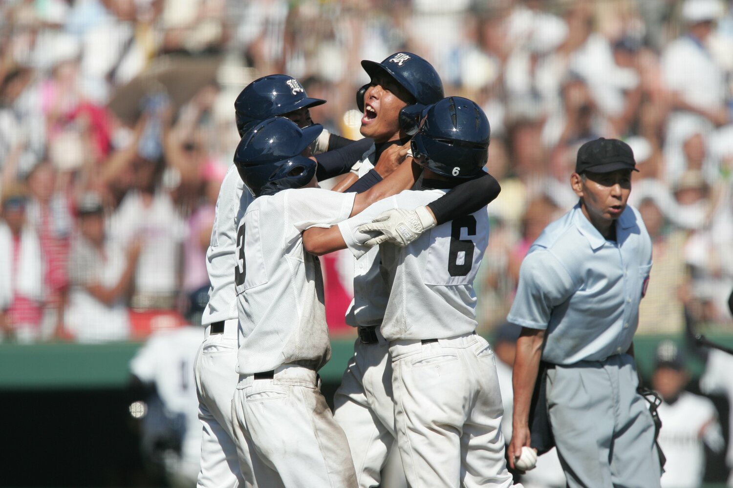 広陵との決勝戦で逆転満塁ホームランを打った副島浩史（真ん中） ©Hideki Sugiyama