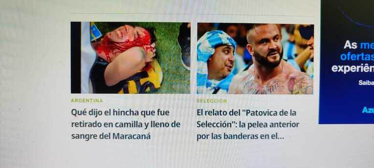 警官に頭を殴られてた出血したアルゼンチンサポ（左の写真）