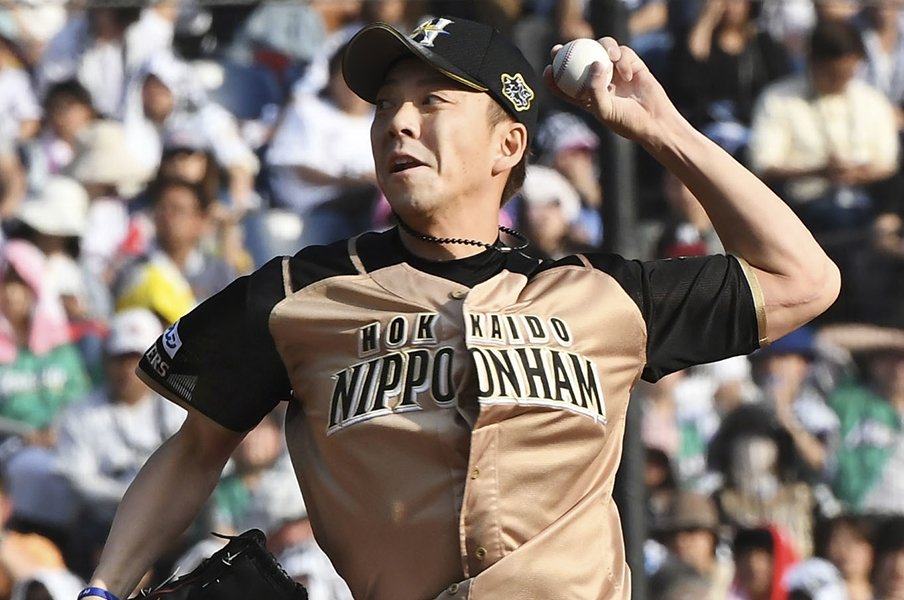 宮西尚生12年連続50試合の先へ。ファイターズのシンボルが挑む!<Number Web> photograph by Kyodo News