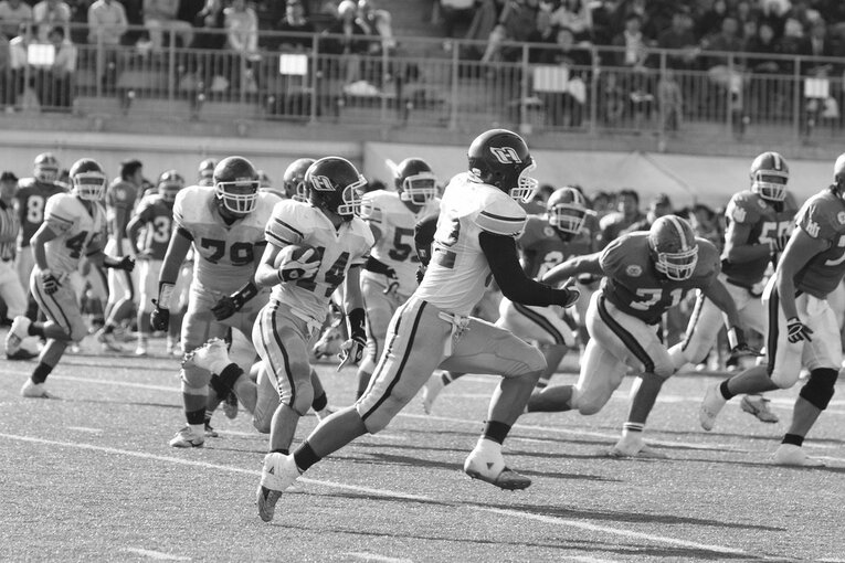 試合中、インターセプトを決めた常木（14番）。一橋側に流れを持ってくるビッグプレーだった／取材対象者提供