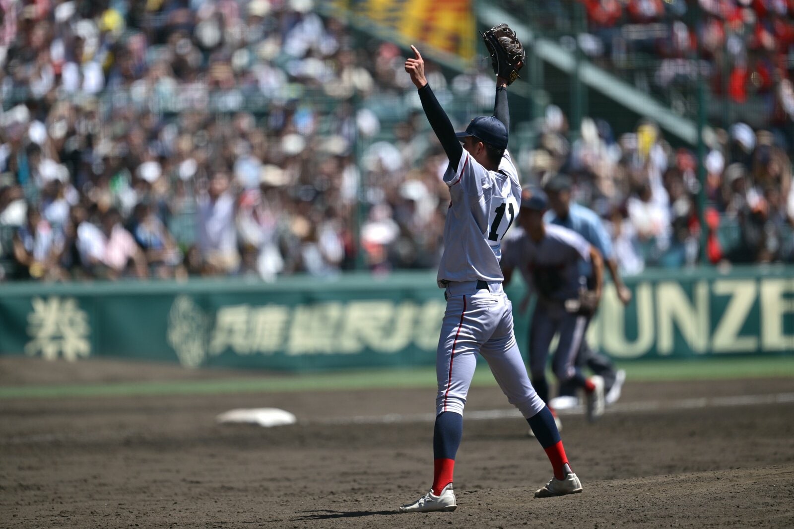 最後の打者はスライダーで三振に。その裏には先輩捕手との阿吽の呼吸があった　photograph by Hideki Sugiyama