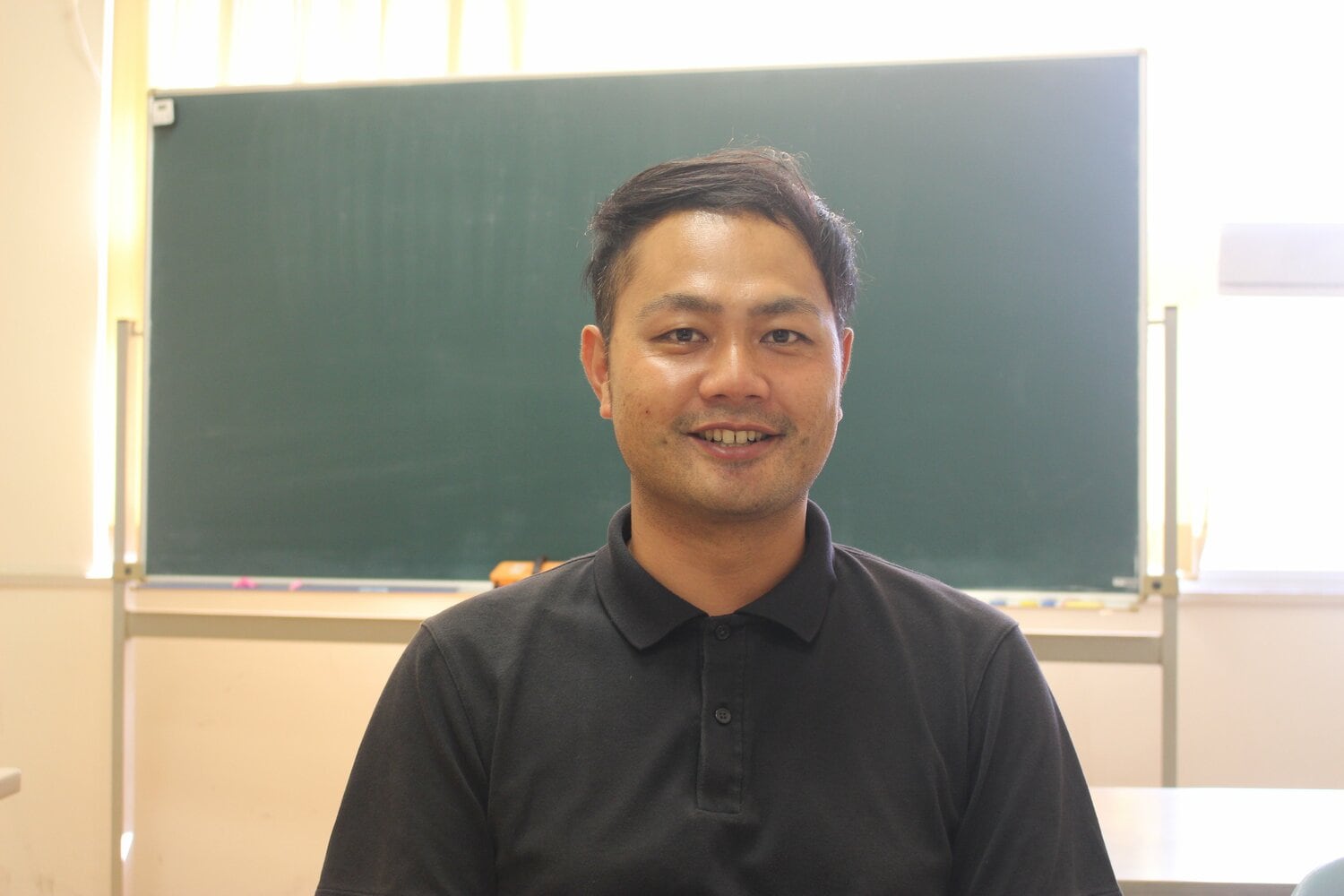 地歴公民科の教諭で、野球部監督でもある黒川健太氏 ©Uhon Cho