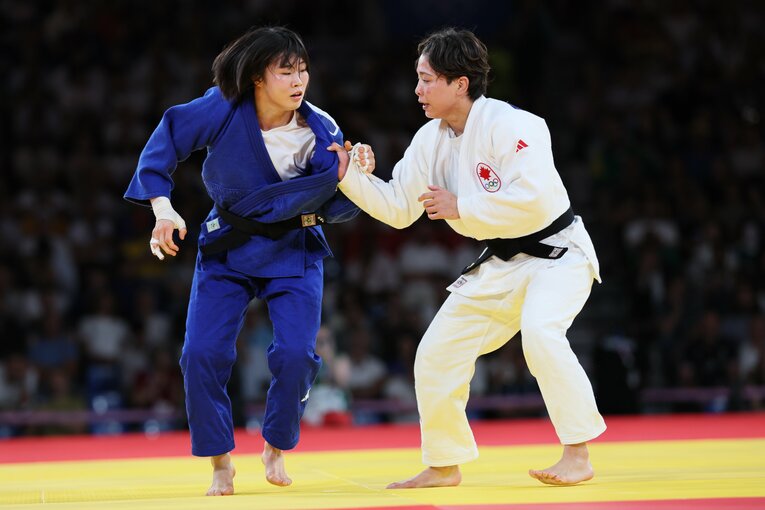 出口とホ・ミミの激闘　©Kaoru Watanabe/JMPA