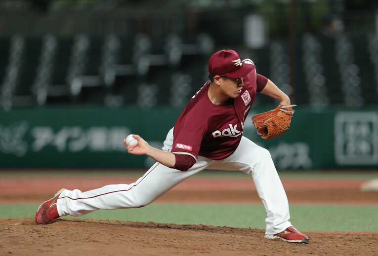 日本復帰後、楽天時代の牧田　©JIJI PRESS