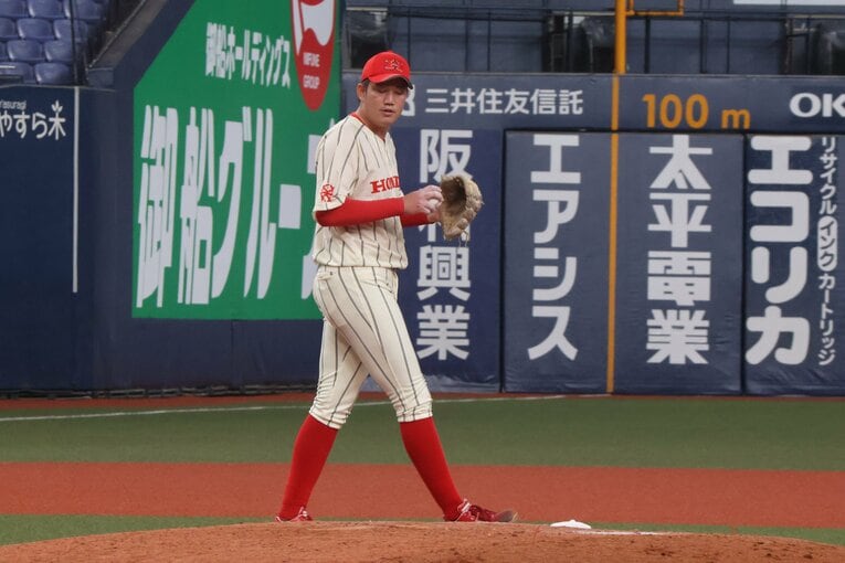 189cmの長身に加え、高校卒業後は15キロの増量に成功。球速も5キロ以上上がった　©Fumi Sawai