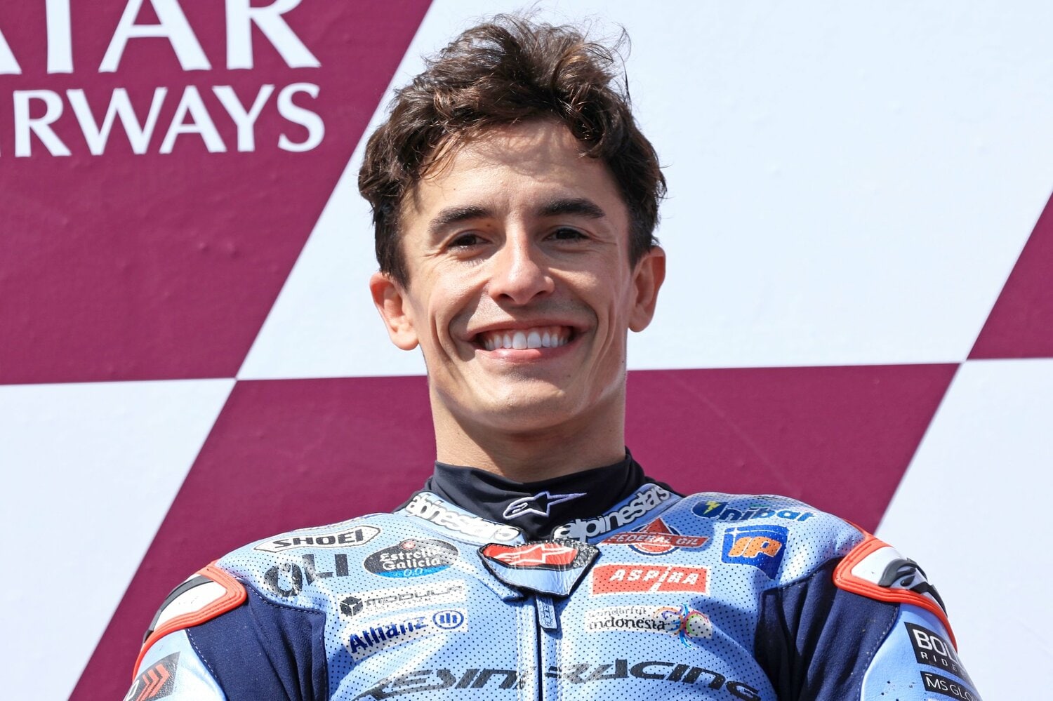 表彰台の頂点に立ったマルケス。昨季に比べると格段に笑顔のシーンが増えた ©Satoshi Endo