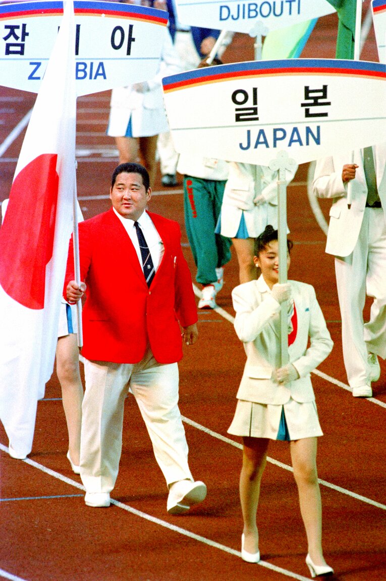 1988年ソウル五輪の閉会式で旗手を務めた斉藤仁。重量級ながら、俊敏かつ精微な技で世界を制した　©︎JIJI PRESS