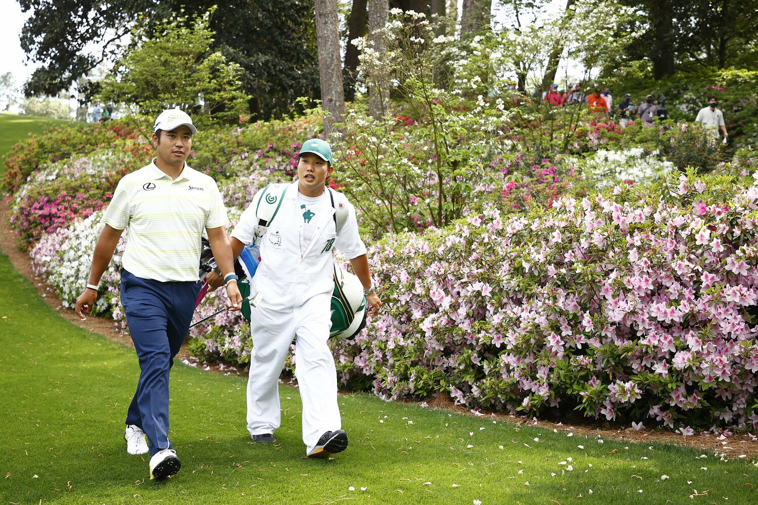 松山と早藤キャディ　©︎Getty Images